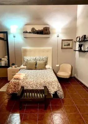 Cama o camas de una habitación en CASA RURAL PRIVADA BENADIZOS ÁVILA