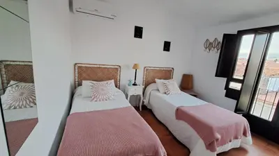 Cama o camas de una habitación en Los Patios.
