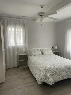 Cama o camas de una habitación en Preciosa casa entera con patio