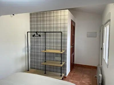 Cama o camas de una habitación en Preciosa casa entera con patio