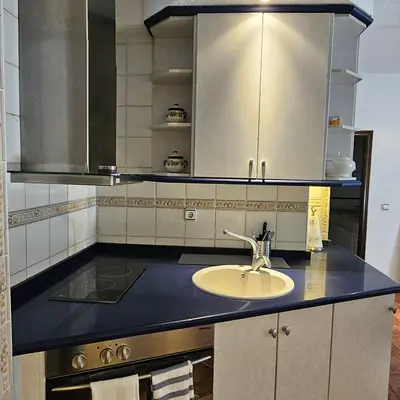 Una cocina o zona de cocina en Apartamento Parque Gredos