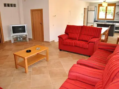 Una televisión o centro de entretenimiento en Holiday home Casa las Margaritas