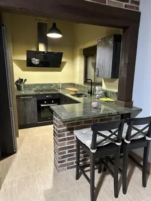 Una cocina o zona de cocina en Los Royares