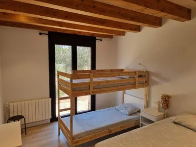 Cama o camas de una habitación en Villa familiar con piscina, en La Vera de Cáceres