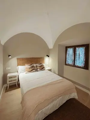 Cama o camas de una habitación en PORTAL DE SANTIAGO