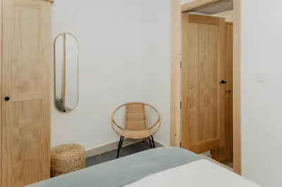 Cama o camas de una habitación en PORTAL DE SANTIAGO