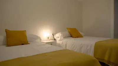 Cama o camas de una habitación en La Higuera ATCC00793