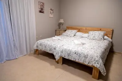 Cama o camas de una habitación en Apartamento El Olivo