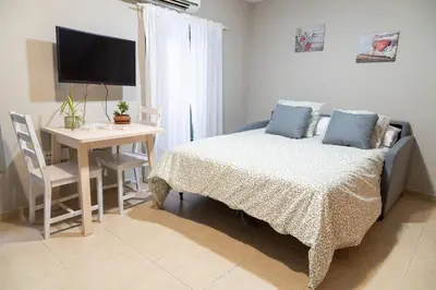 Cama o camas de una habitación en Apartamento El Olivo