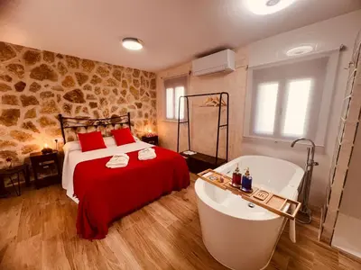 Cama o camas de una habitación en La Mansión de La Adrada
