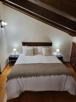 Cama o camas de una habitación en El Refugio de Gredos