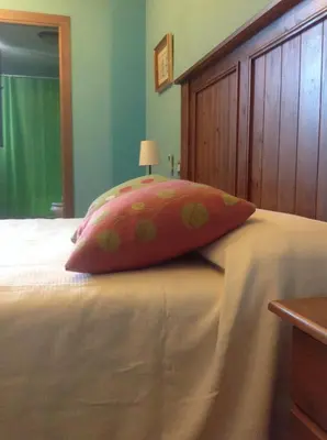 Cama o camas de una habitación en Apartamentos Sierra de Francia