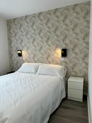 Cama o camas de una habitación en Apartamentos centro I.II