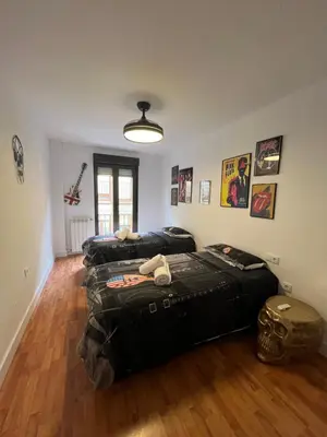 Cama o camas de una habitación en VIVIENDA DE USO TURÍSTICO ENJOY ÁVILA 4- DIVINO