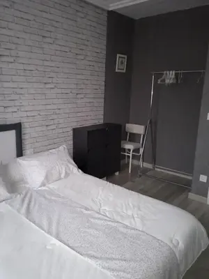Cama o camas de una habitación en Alojamiento Roma
