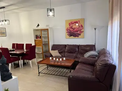 Zona de estar de La Casa de los Almendros AT-BA-00294