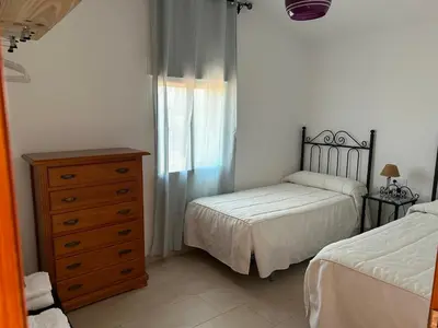 Cama o camas de una habitación en La Casa de los Almendros AT-BA-00294