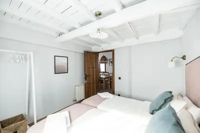 Cama o camas de una habitación en Apartamentos Rurales 