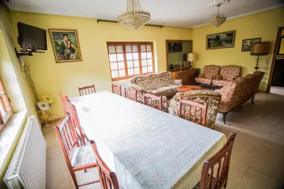Una televisión o centro de entretenimiento en CASA EL CARMEN 1