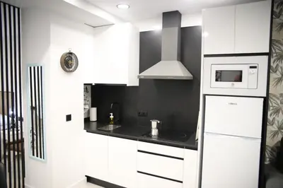 Una cocina o zona de cocina en E&R-1 Plaza España