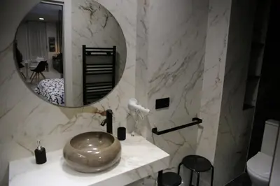Un baño de E&R-1 Plaza España