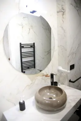Un baño de E&R-1 Plaza España
