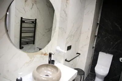 Un baño de E&R-1 Plaza España