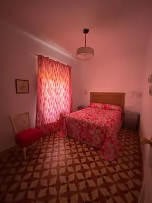 Cama o camas de una habitación en La casa de Alejandra, planta alta.