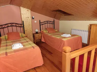 Cama o camas de una habitación en CASA RURAL LA SERROTA
