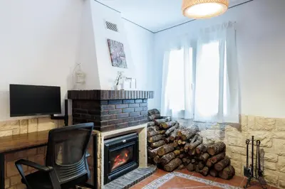 Una televisión o centro de entretenimiento en La Casita de la Gula AT 2 llaves