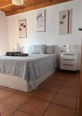 Cama o camas de una habitación en La Terraza de Consolación 17
