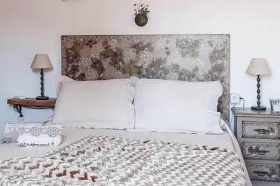 Cama o camas de una habitación en El Escondite de Molina. Valle del Tiétar.