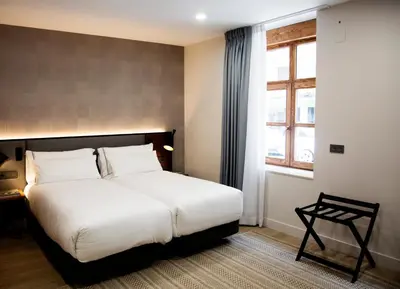 Cama o camas de una habitación en Prisma Suites