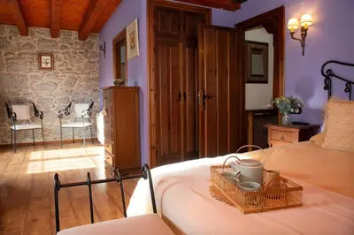 Cama o camas de una habitación en Casa rural María Saula