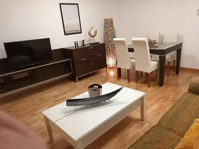 Una televisión o centro de entretenimiento en Alojamiento Fonseca