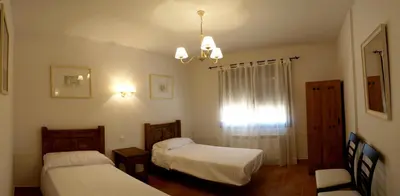 Cama o camas de una habitación en Valdebruna de Gredos