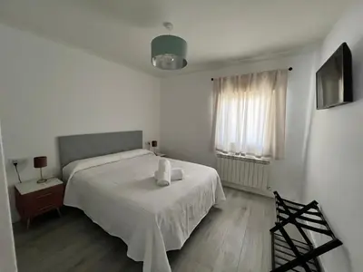 Cama o camas de una habitación en El descanso de la Covatilla