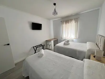 Cama o camas de una habitación en El descanso de la Covatilla