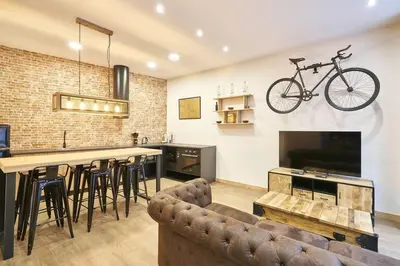 Una cocina o zona de cocina en Loft diseño el taller del abuelo con parking