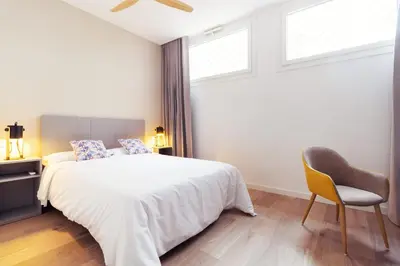 Cama o camas de una habitación en Acanto Apartamentos