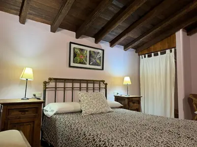 Cama o camas de una habitación en La Casona De Jaraiz