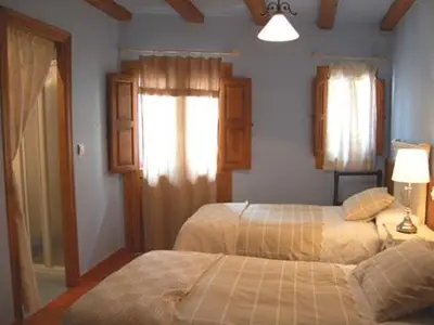 Cama o camas de una habitación en Apartamento Turístico El Sotanillo de Valverde de la Vera