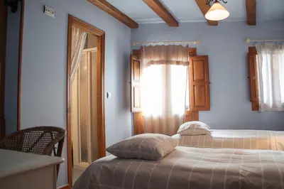 Cama o camas de una habitación en Apartamento Turístico El Sotanillo de Valverde de la Vera