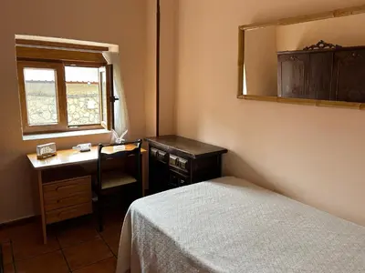 Cama o camas de una habitación en Casa Rivendel - Fantasía, Confort y Naturaleza