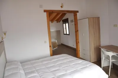 Cama o camas de una habitación en La Costurera