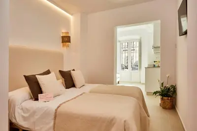 Cama o camas de una habitación en LUPERCAS
