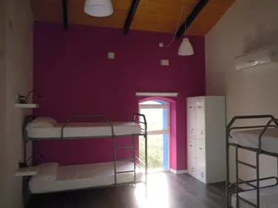 Cama o camas de una habitación en Hostel Cañaveral