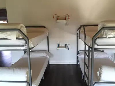Cama o camas de una habitación en Hostel Cañaveral