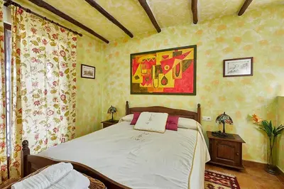 Cama o camas de una habitación en Los Robles Casa Rural 5 Estrellas de Calidad