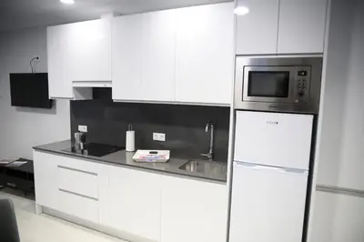 Una cocina o zona de cocina en E&R-2 Plaza España